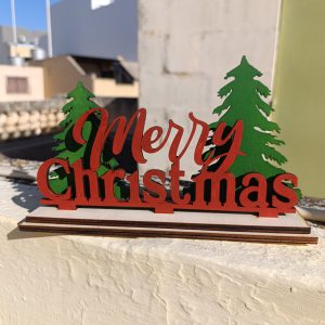Wooden laser cut Merry Christmas bold words with trees decoration for table or desks.