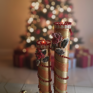 Handmade decorative Christmas candle holders with metallic finish and festive embellishments