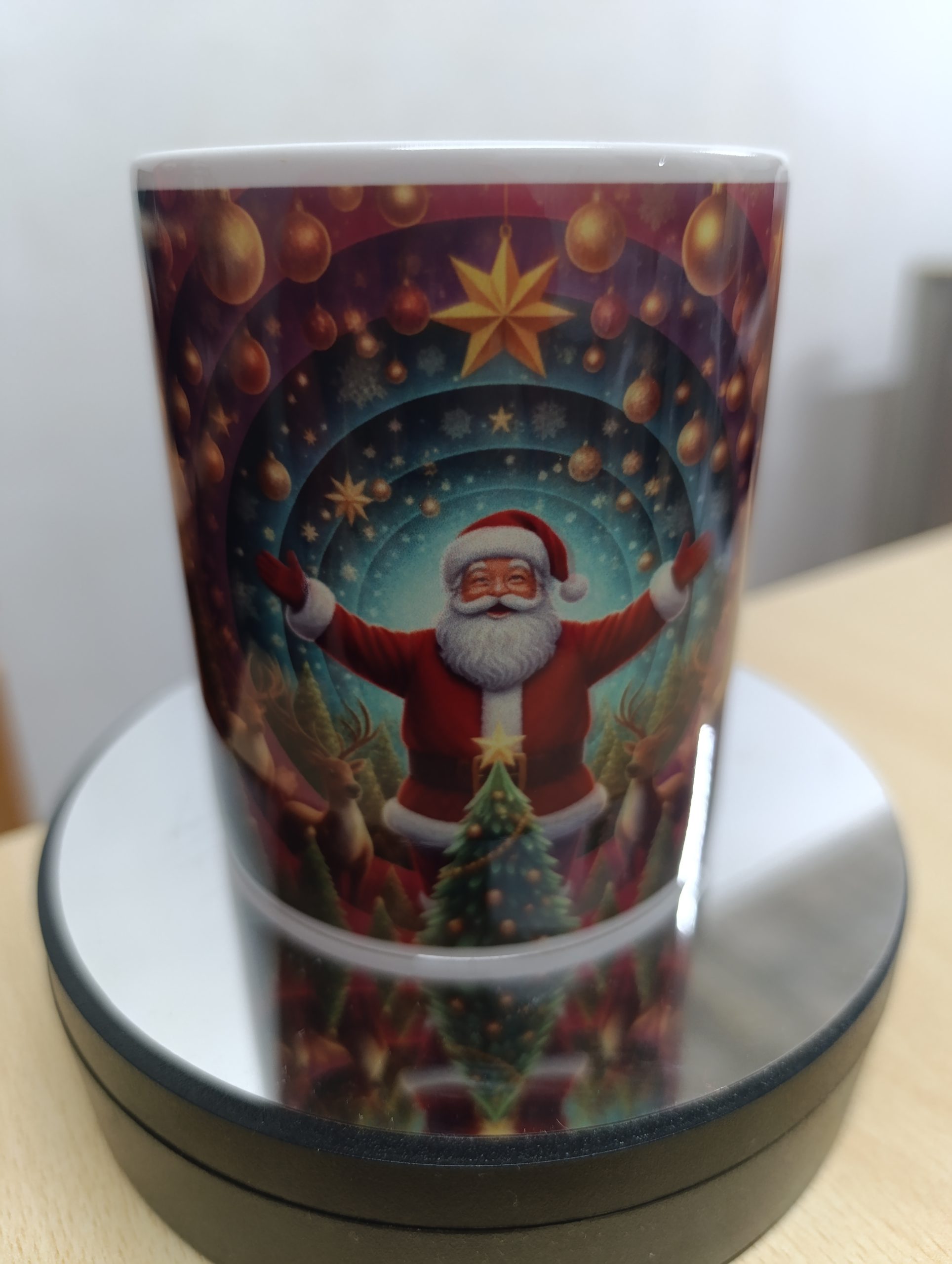 Ceramic mug with colorful Christmas scene featuring Santa and a decorated Christmas tree