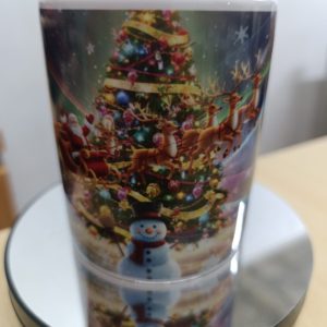 Ceramic mug with colorful Christmas scene featuring Santa, reindeer, snowman, and a decorated Christmas tree